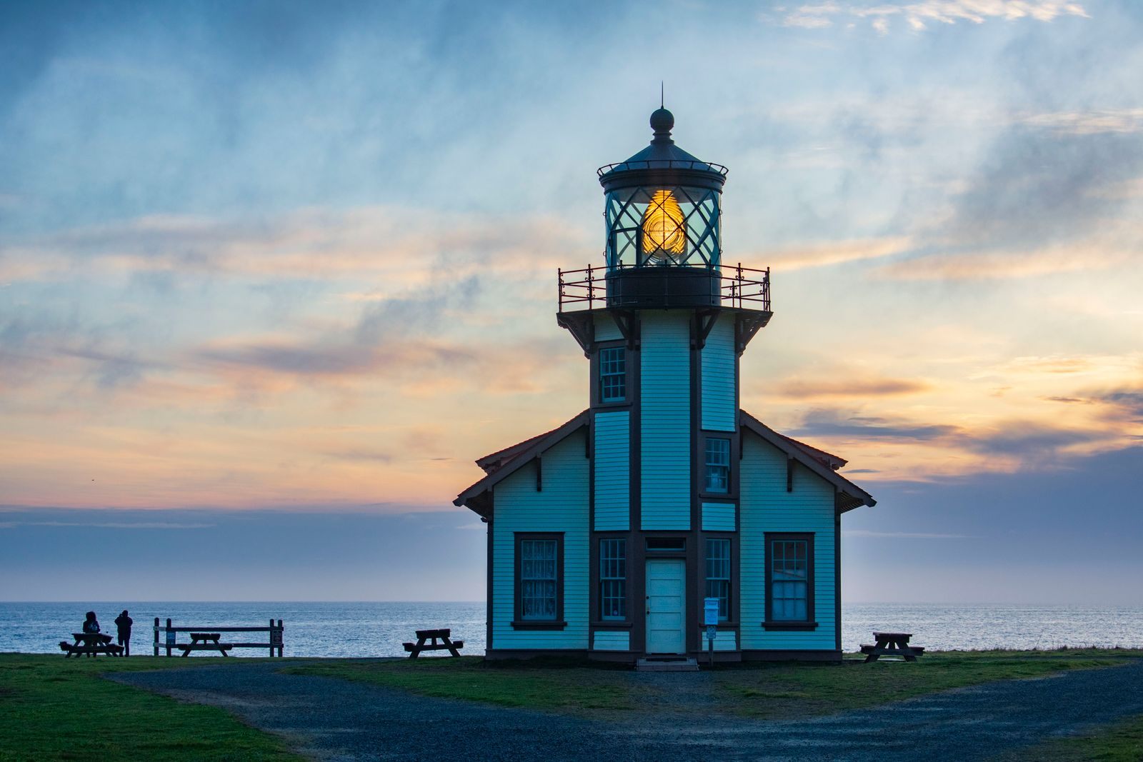 The Point Cabrillo lighthouse near Mendocino lit up at twilight